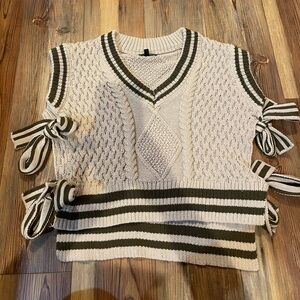 Paper moon sweater vest